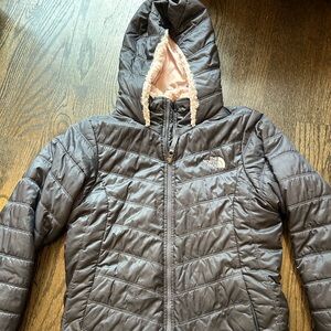 North face black winter jacked with pink fluffy liner reversible